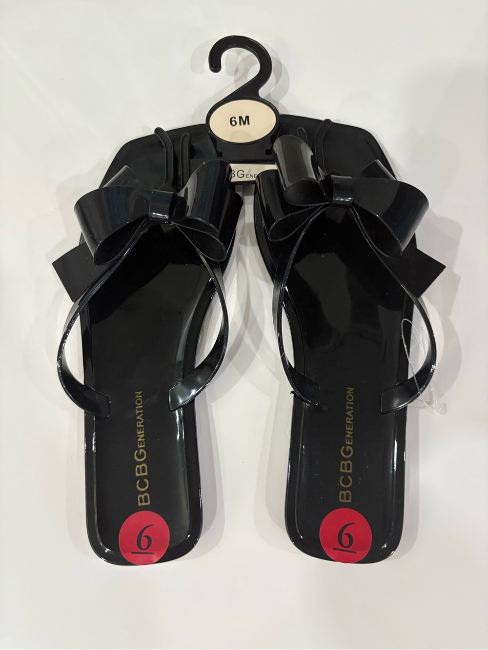 BCBGeneration Black Bow Jelly Sandals